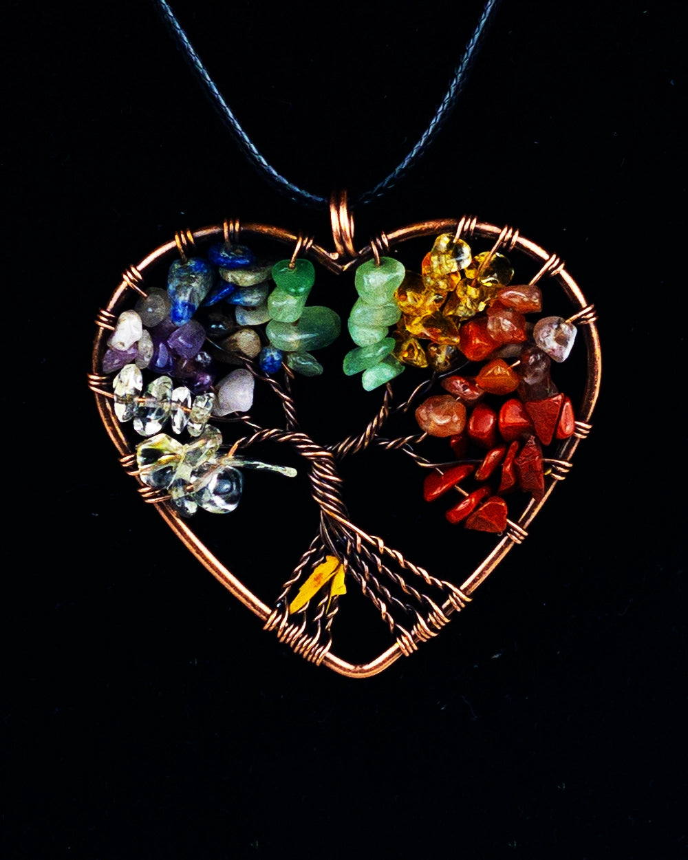 A copper necklace with a design resembling a tree, adorned with colorful gemstones.