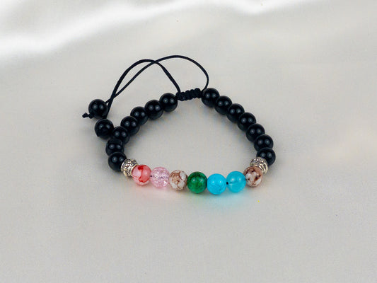 Black beaded bracelet with colorful beads on a white background