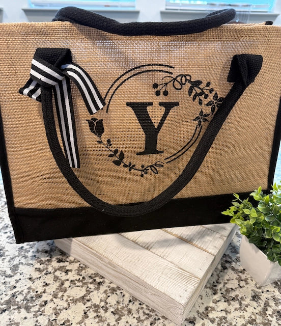 Jute bag with a monogram 'Y' on a countertop