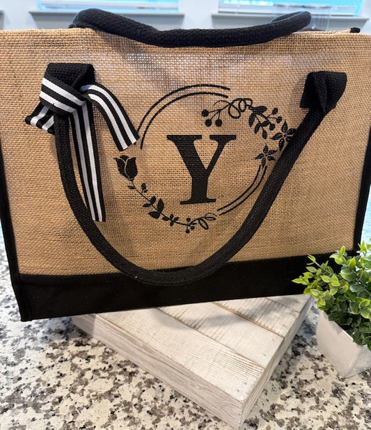 Jute bag with a monogram 'Y' on a countertop