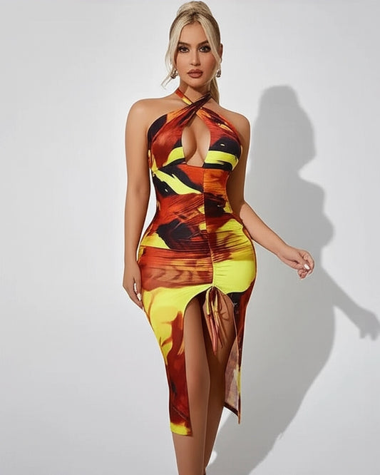 Woman wearing a colorful halter neck dress on a white background